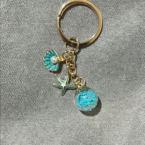 Gold and Blue Ocean-Themed Keychain